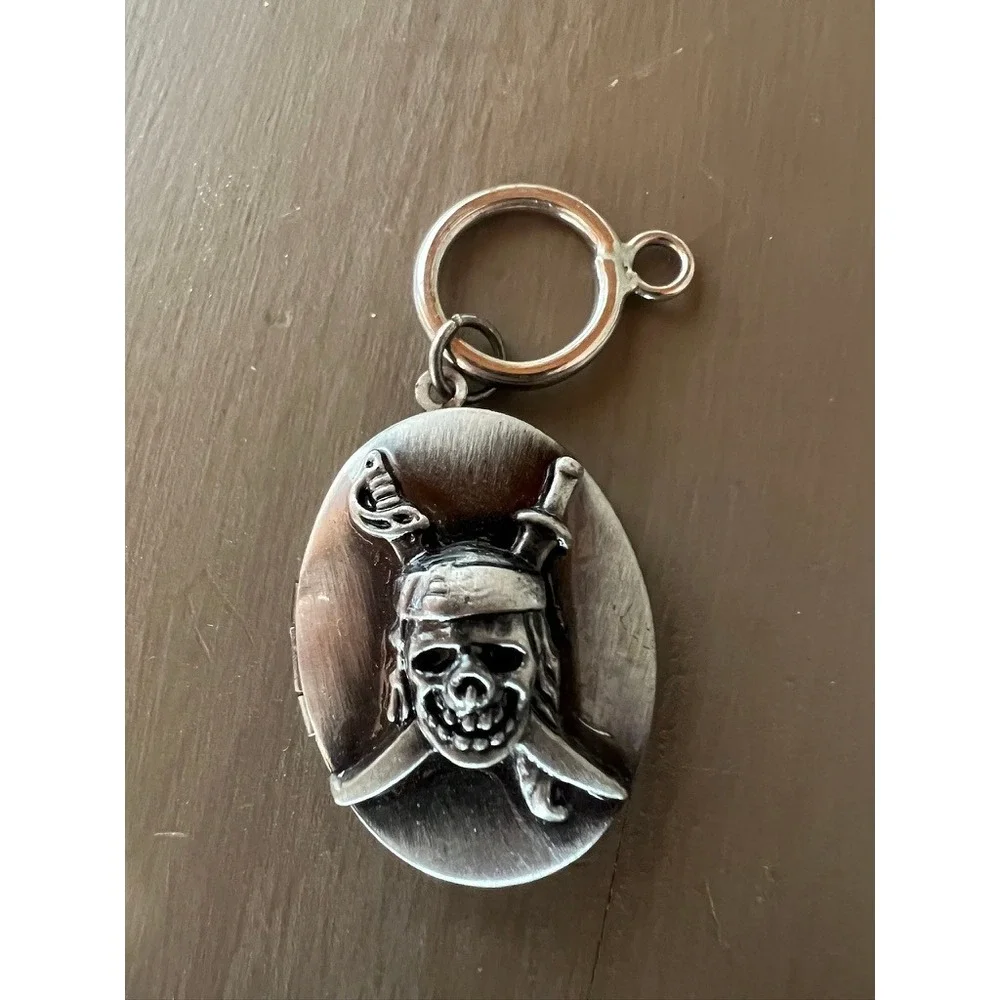 Disney Pirates of the Caribbean Locket Keychain Jack Sparrow Skull Silver Tone